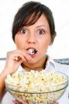 depositphotos_62396539-stock-photo-young-woman-eating-popcorn.jpg
